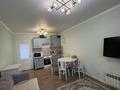 2-комнатная квартира · 55 м² · 12/12 этаж, Кабанбай батыра 59б за 33 млн ₸ в Астане, Нура р-н — фото 4