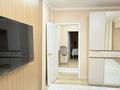 3-комнатная квартира · 76 м² · 1/9 этаж, мкр Аксай-3Б за 46 млн ₸ в Алматы, Ауэзовский р-н — фото 30