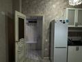 2-комнатная квартира · 52 м² · 8/12 этаж, 16-й мкр 56 — Вдоль дороги за 15 000 ₸ в Актау — фото 9