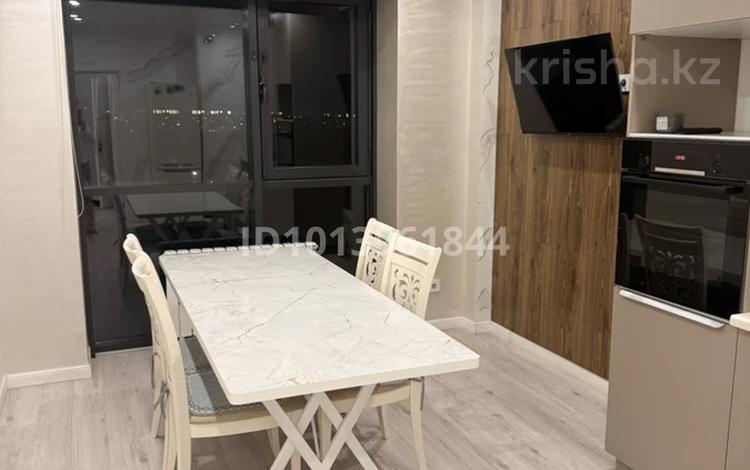 2-комнатная квартира · 52 м² · 9/13 этаж, Толе би 189/3 за 370 000 ₸ в Алматы, Алмалинский р-н — фото 2