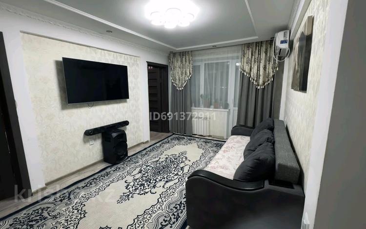 4-комнатная квартира, 60 м², 5/5 этаж, Мухамеджанова 19 за 20 млн 〒 в Балхаше — фото 2