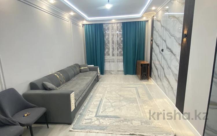 1-комнатная квартира · 52 м² · 1/12 этаж, 4-й мкр. 62блок3 за 250 000 〒 в Конаеве — фото 2
