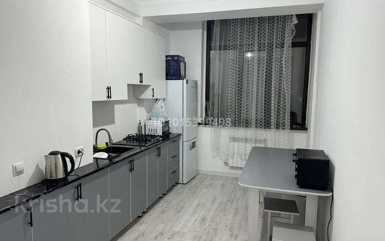 2-комнатная квартира · 68 м² · 5/9 этаж, мкр Астана, Пр. Толе би 118 за 200 000 ₸ в Таразе — фото 2