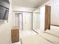 3-комнатная квартира · 65 м² · 12/12 этаж, мкр Аксай-1А — Төле би Момышұлы за 45 млн ₸ в Алматы, Ауэзовский р-н — фото 7