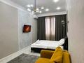 1-комнатная квартира · 50 м² · 14/16 этаж, 14-й мкр №84 участок — Звезда Актау,Сая Парк за 20 000 ₸ — фото 9