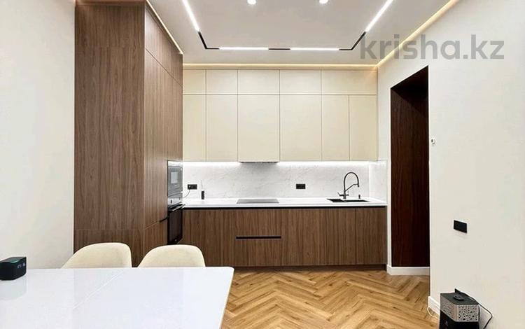 2-комнатная квартира · 55 м² · 8/12 этаж, Тургут Озала 194 за 400 000 ₸ в Алматы, Алмалинский р-н — фото 2