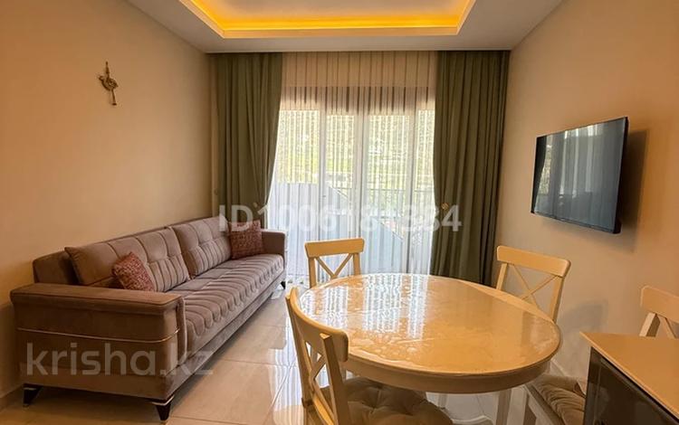 2-комнатная квартира · 54 м² · 6/12 этаж, Mahmutlar Mahallesi Fevzi Cakmak Caddesi 63B за 35 млн ₸ в Аланье — фото 21