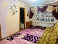 4-комнатная квартира, 60.5 м², 4/5 этаж, 21 мкр за 14 млн 〒 в Караганде, Алихана Бокейханова р-н