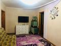 4-комнатная квартира, 60.5 м², 4/5 этаж, 21 мкр за 14 млн 〒 в Караганде, Алихана Бокейханова р-н — фото 2