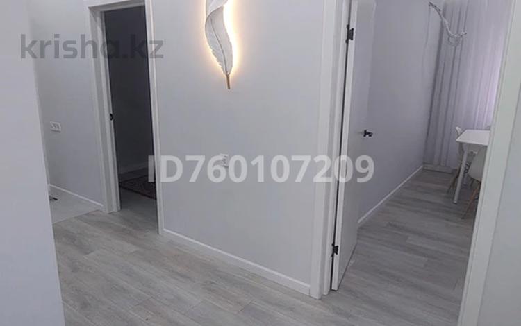 2-комнатная квартира · 64 м² · 5/9 этаж, мкр Нурсая, Мкрн Нурсая — Бином мектеп за 260 000 ₸ в Атырау — фото 2