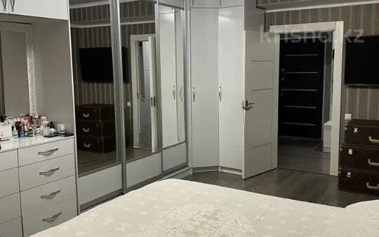 2-комнатная квартира · 64 м² · 4/15 этаж, Толе би 273/5 за 49 млн ₸ в Алматы, Алмалинский р-н — фото 3