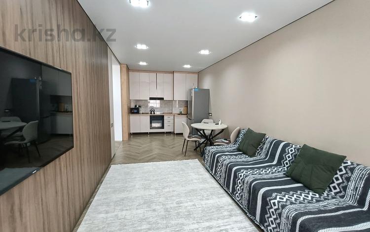 2-комнатная квартира · 48 м² · 7/16 этаж, Утепова 31 за 49 млн ₸ в Алматы, Бостандыкский р-н — фото 2