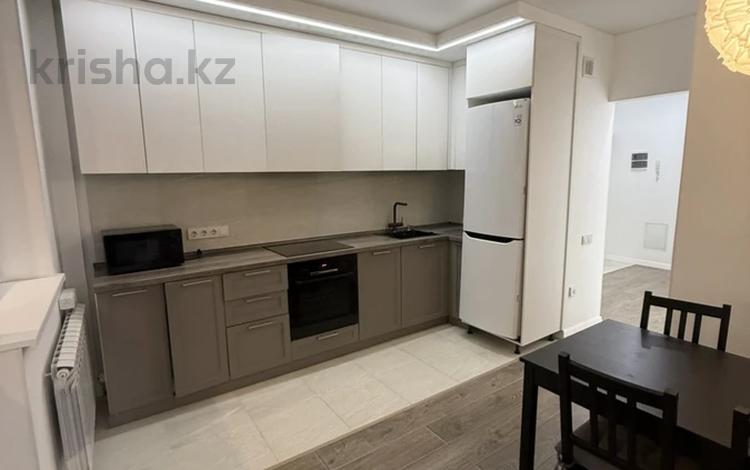 2-комнатная квартира · 54 м² · 12/12 этаж, Абикен Бектуров 1 за 40 млн ₸ в Астане, Есильский р-н — фото 2