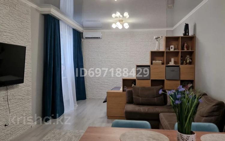 2-комнатная квартира, 57.8 м², 6/10 этаж, Кенесары хана 54 за 41 млн 〒 в Алматы, Наурызбайский р-н — фото 2