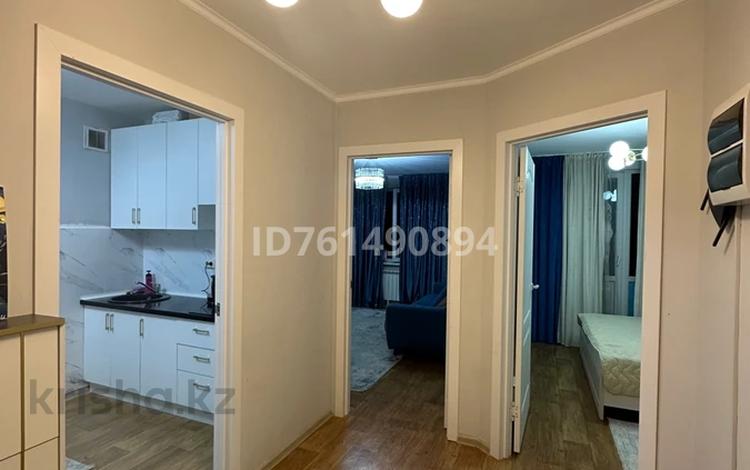 2-комнатная квартира · 56 м² · 7/9 этаж, Б. Момышулы 5 за 280 000 ₸ в Алматы, Алатауский р-н — фото 2