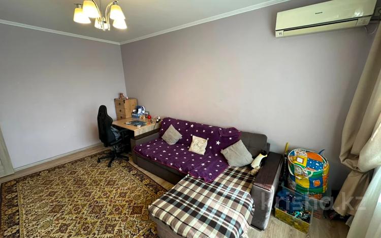 2-комнатная квартира · 58 м² · 8/9 этаж, мкр Аксай-2 за 40 млн ₸ в Алматы, Ауэзовский р-н — фото 6