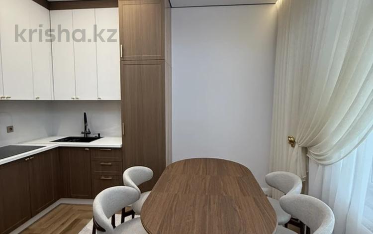 2-бөлмелі пәтер · 64 м² · 2/17 қабат, Толе Би 20 — Толе Би, бағасы: 49 млн ₸ в Астане, Нура р-н — фото 2