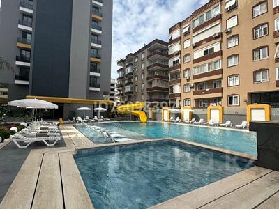 3-комнатная квартира · 84.9 м² · 10/11 этаж, Mahmutlar, Barbaros Cd., 07460 Alanya/Antalya — Barbaros Cd- Mehmet Çakır Cd за 150 млн 〒 в Аланье