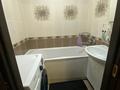4-комнатная квартира · 80 м² · 10/10 этаж, мкр Юго-Восток, Сатыбалдина за 28 млн ₸ в Караганде, Казыбек би р-н — фото 5