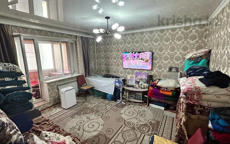 2-комнатная квартира · 54 м² · 7/12 этаж, мкр Аксай-1А за 34 млн ₸ в Алматы, Ауэзовский р-н — фото 2