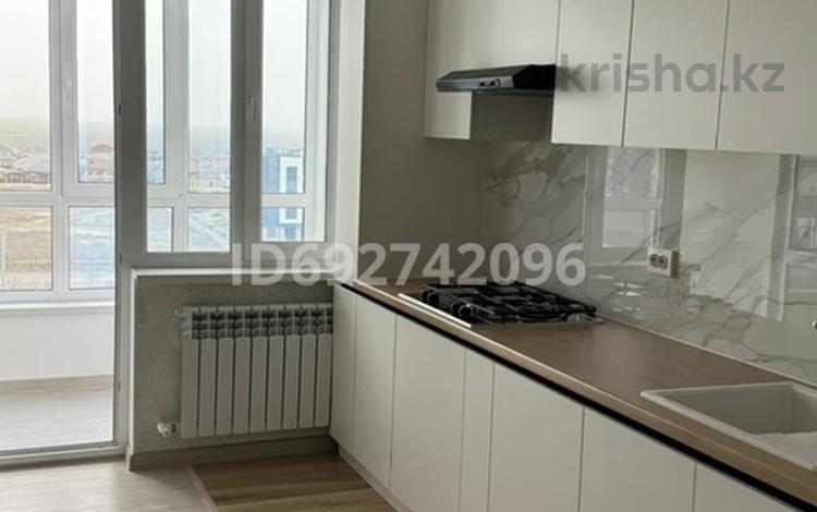 1-комнатная квартира, 45 м², 8/9 этаж, мкр Нурсая, Мкрн Нурсая — ул. Елорда, рядом школа НИШ, БИНОМ за 21 млн 〒 в Атырау, мкр Нурсая — фото 2