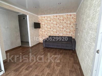 2-комнатная квартира, 47 м², 1 этаж, Ержанова 55 за 15.5 млн 〒 в Караганде, Казыбек би р-н