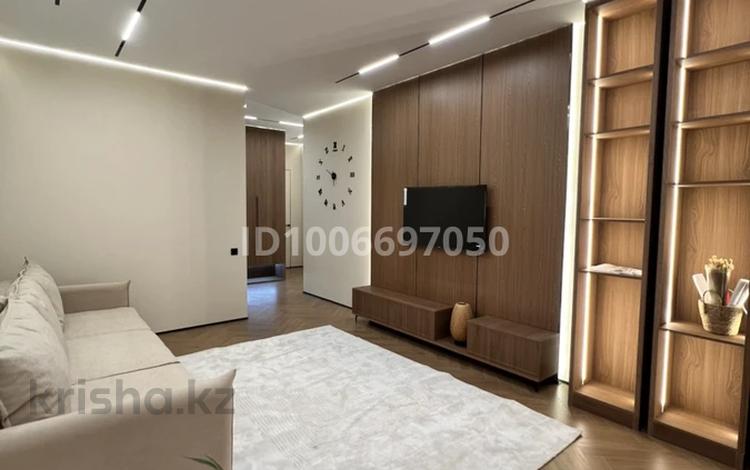 2-бөлмелі пәтер · 67 м² · 4/9 қабат, Толе би 59 — ТРЦ Хан-Шатыр, бағасы: ~ 70 млн ₸ в Астане, Есильский р-н — фото 2