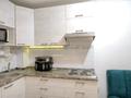 1-комнатная квартира · 45 м² · 5/9 этаж, мкр Нуркент, Б. Момышулы 5 за 210 000 ₸ в Алматы, Алатауский р-н — фото 4