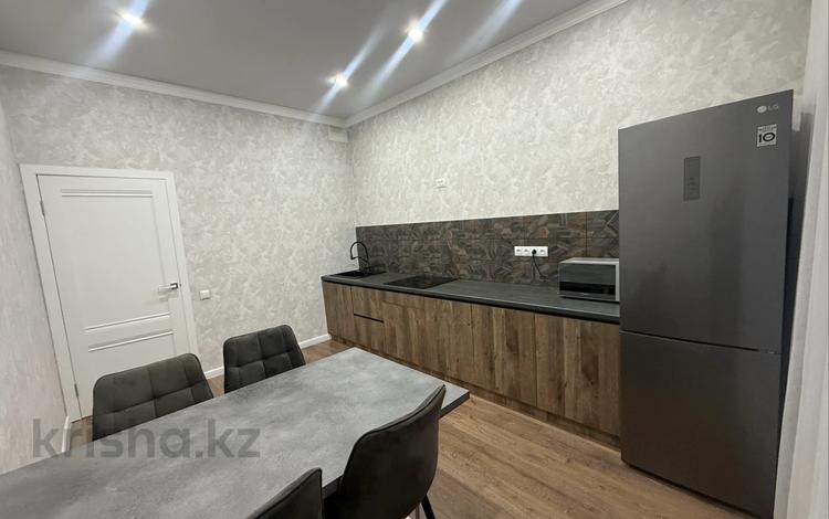 2-комнатная квартира · 70 м² · 10/10 этаж, мкр Юго-Восток, микрорайон Байкена Ашимова за 39.8 млн ₸ в Караганде, Казыбек би р-н — фото 2