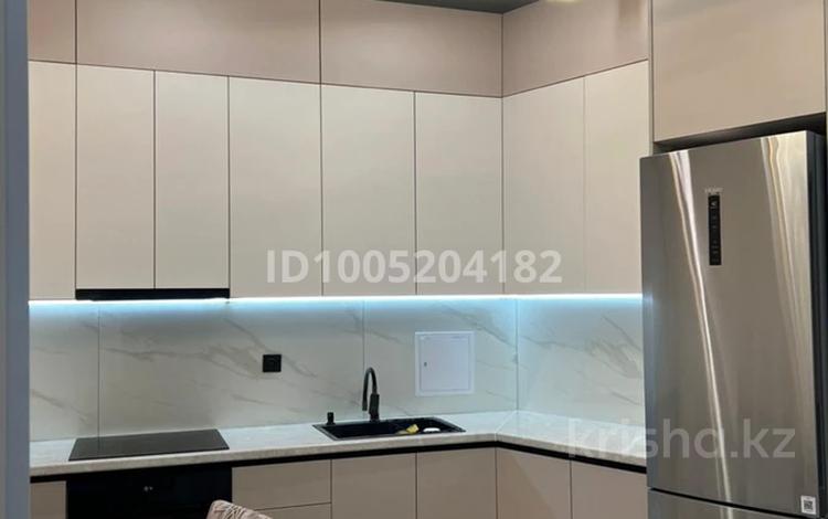 2-комнатная квартира · 63.5 м² · 4/13 этаж, 19-й мкр, 19 мкрн 4/4 за 27.5 млн ₸ в Актау — фото 2