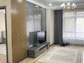 2-комнатная квартира · 50 м² · 2/21 этаж, Калдаякова 3 — Бизнес класс за 300 000 〒 в Астане, Сарайшык р-н — фото 4