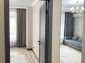 2-комнатная квартира · 50 м² · 2/21 этаж, Калдаякова 3 — Бизнес класс за 300 000 〒 в Астане, Сарайшык р-н — фото 5