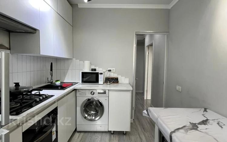2-бөлмелі пәтер · 53 м² · 7/9 қабат, мкр Аксай-2 76, бағасы: 45 млн ₸ в Алматы, Ауэзовский р-н — фото 2