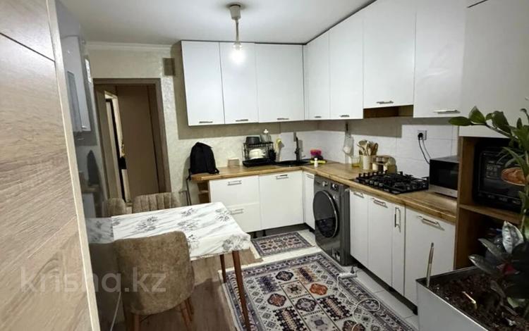 2-бөлмелі пәтер · 51 м² · 2/5 қабат, мкр Аксай-3А 61, бағасы: 35.5 млн ₸ в Алматы, Ауэзовский р-н — фото 2