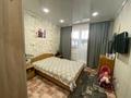 2-комнатная квартира, 70 м², 4/5 этаж, 10 мкр 28 за 28.5 млн 〒 в Аксае — фото 4