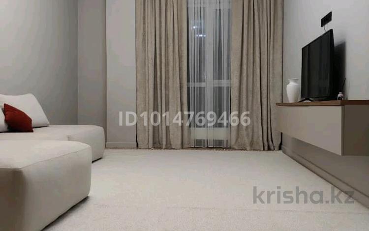 2-комнатная квартира · 65 м² · 12 этаж, Сыганак 17у за 450 000 ₸ в Астане, Нура р-н — фото 2