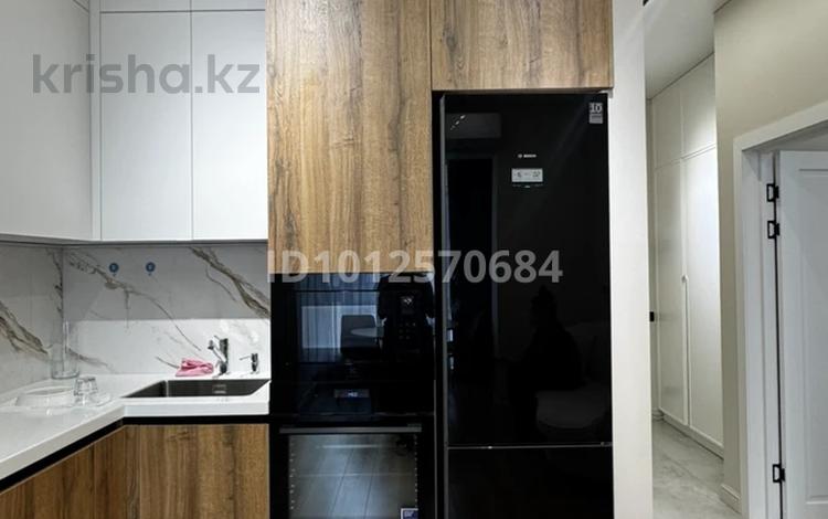 2-комнатная квартира · 50 м² · 19/20 этаж, Серкебаева 146 за 63 млн ₸ в Алматы, Бостандыкский р-н — фото 17