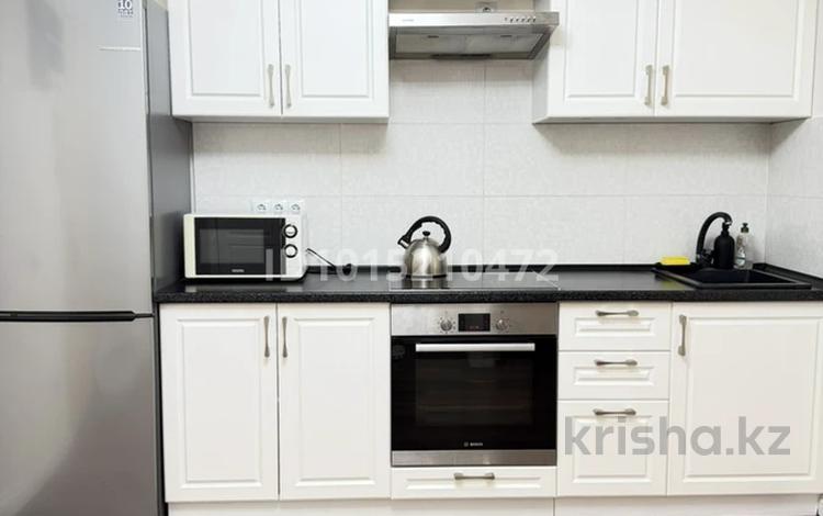 2-комнатная квартира · 40.6 м² · 1/8 этаж, Б. Момышулы 5 за 28.3 млн ₸ в Алматы, Алатауский р-н — фото 2