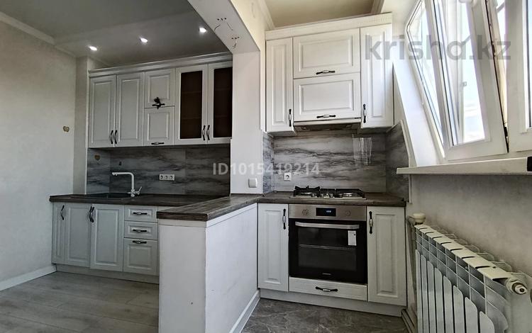 3-комнатная квартира · 76 м² · 8/9 этаж, мкр Аксай-1 за 48 млн ₸ в Алматы, Ауэзовский р-н — фото 2