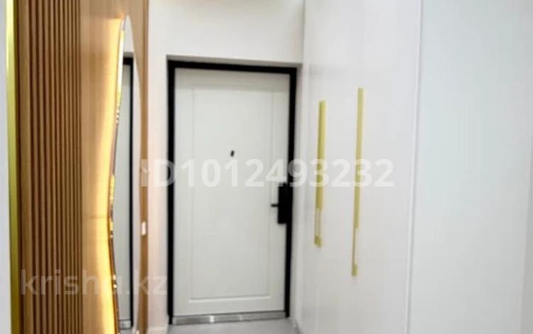2-комнатная квартира · 48.5 м² · 5/12 этаж, мкр Нуркент, Турара Рыскулова за 39.5 млн ₸ в Алматы, Алатауский р-н — фото 2