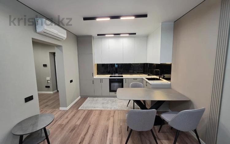 2-бөлмелі пәтер · 50 м², Толе Би 290/1, бағасы: 47.5 млн ₸ в Алматы, Алмалинский р-н — фото 3