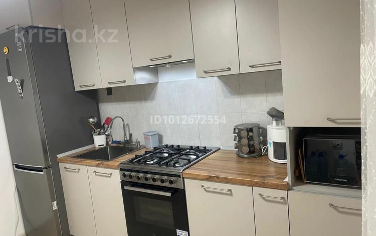 2-комнатная квартира · 52 м² · 5/9 этаж, жилой массив Есет Батыр, Бопай ханым 7б — 4-й микрорайон, 19г / Бопай ханым улица, 76 за 20 млн ₸ в Актобе — фото 2