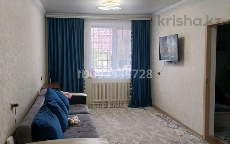 2-комнатная квартира, 50 м², 1/2 этаж, Байгазиева за 20 млн 〒 в Каскелене — фото 2