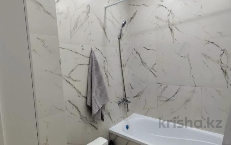2-комнатная квартира · 48 м² · 12/12 этаж, Кабанбай батыра 59 за 300 000 ₸ в Астане, Нура р-н — фото 2