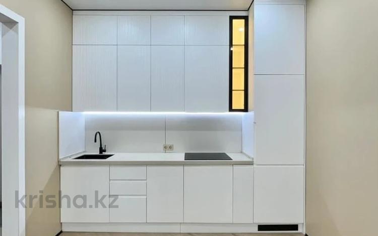 2-комнатная квартира · 50 м² · 8/12 этаж, Тургут Озала 194 за 53 млн ₸ в Алматы, Алмалинский р-н — фото 5