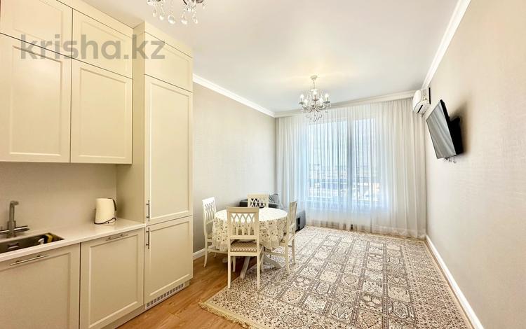 2-комнатная квартира · 55.7 м² · 3/9 этаж, Аль-Фараби 35 за 50 млн ₸ в Астане, Есильский р-н — фото 3
