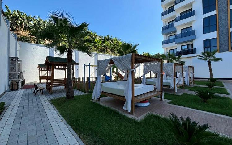 2-комнатная квартира · 60 м² · 9/10 этаж, Аланья Махмутлар 45 за 40.7 млн 〒 — фото 2