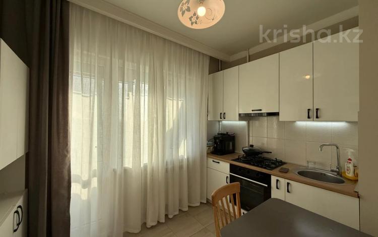 2-комнатная квартира · 54.3 м² · 7/9 этаж, мкр Аксай-5 за 45.5 млн ₸ в Алматы, Ауэзовский р-н — фото 2