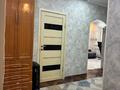 3-комнатная квартира · 65.7 м² · 12/12 этаж, мкр Аксай-1А 10 — Толе би - Момышулы за 40 млн 〒 в Алматы, Ауэзовский р-н — фото 8