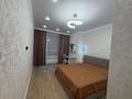 2-бөлмелі пәтер · 70 м² · 11/18 қабат, ул. Е-36 4, бағасы: 43.9 млн ₸ в Астане, Нура р-н — фото 3